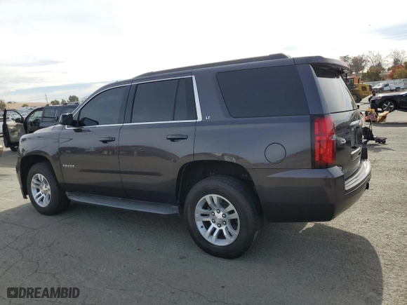 2015 Chevrolet Tahoe LT with VIN 1GNSCBKC8FR246289, listed as a Copart auction lot 81521014 with 102,256 mi miles and Salvage Title. Bid and sale history available at carsss.com. Image 2.