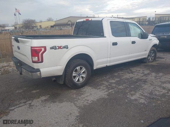 2015 Ford F-150 XLT w/HD Payload Pkg with VIN 1FTFW1EG3FFC39052, listed as a IAAI auction lot 41046847 with 151,061 mi miles. Bid and sale history available at carsss.com. Image 4.
