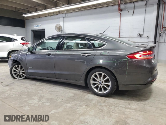 2017 Ford Fusion Titanium z VIN 3FA6P0SU3HR209563, wystawiony jako Copart lot #52039915 z przebiegiem 119 961 mil mil oraz Szkoda całkowita • Salvage title. Historia ofert i sprzedaży dostępna na DreamBid. Obrazek 2.