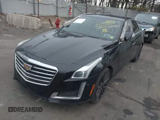 2019 Cadillac CTS Luxury RWD with VIN 1G6AR5SS2K0100788, listed as a IAAI auction lot 41515814 with 70,799 mi miles and . Bid and sale history available at DreamBid. Image 2.