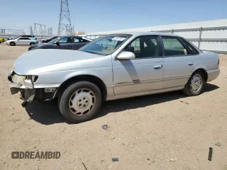 1995 Ford Taurus GL with VIN 1FALP52U0SG152415, listed as a Copart auction lot 62920765 with 90,920 mi miles and Salvage title. Bid and sale history available at DreamBid. Image 1.