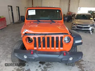 2023 Jeep Wrangler Sport with VIN 1C4HJXDG7PW676453, listed as a IAAI auction lot 42222995 with 32,347 mi miles and . Bid and sale history available at DreamBid. Image 12.