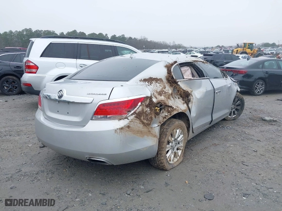 2013 Buick LaCrosse with VIN 1G4GA5E34DF120832, listed as a IAAI auction lot 41106006 with 141,936 mi miles. Bid and sale history available at carsss.com. Image 4.