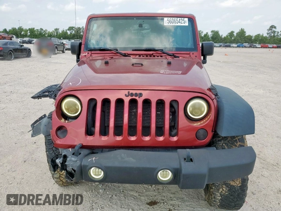 2013 Jeep Wrangler Unlimited Sport z VIN 1C4BJWDGXDL606491, wystawiony jako Copart lot #56065425 z przebiegiem 168 709 mil mil oraz Szkoda całkowita • Salvage title. Historia ofert i sprzedaży dostępna na DreamBid. Obrazek 5.