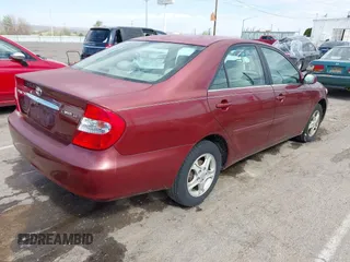 2004 Toyota Camry LE z VIN 4T1BE30K74U364617, wystawiony jako IAAI lot #42046280 z przebiegiem 150 659 mil mil oraz . Historia ofert i sprzedaży dostępna na DreamBid. Obrazek 4.