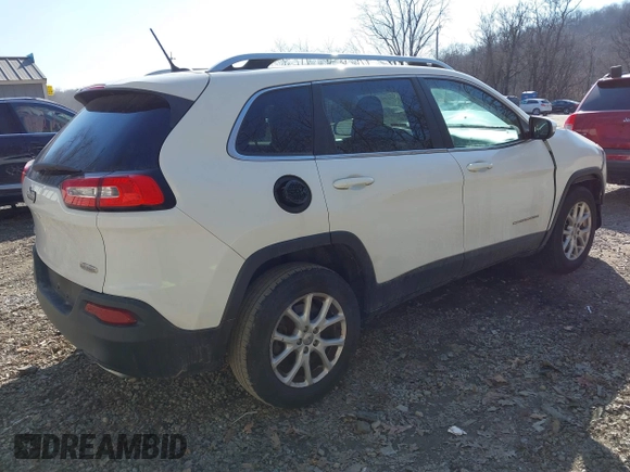 2015 Jeep Cherokee Latitude with VIN 1C4PJMCS7FW503594, listed as a IAAI auction lot 41792820 with 77,325 mi miles. Bid and sale history available at carsss.com. Image 4.