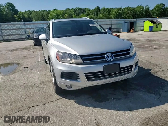 2014 Volkswagen Touareg Lux with VIN WVGEF9BP1ED012267, listed as a Copart auction lot 58924055 with 81,009 mi miles and Salvage title. Bid and sale history available at DreamBid. Image 14.