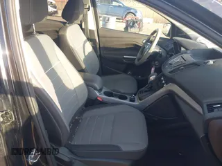 2015 Ford Escape SE with VIN 1FMCU0G79FUA40322, listed as a IAAI auction lot 41791960 with 124,543 mi miles. Bid and sale history available at carsss.com. Image 5.
