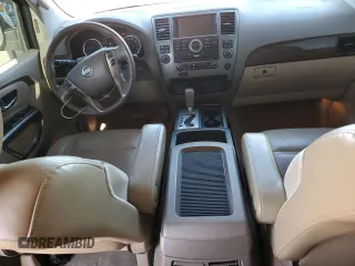 2015 Nissan Armada SV z VIN 5N1BA0ND8FN616053, wystawiony jako Copart lot #88253385 z przebiegiem 211 004 mil mil oraz Szkoda całkowita • Salvage title. Historia ofert i sprzedaży dostępna na DreamBid. Obrazek 8.