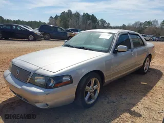 2004 Mercury Marauder with VIN 2MHHM79V74X675447, listed as a IAAI auction lot 41833704 with 244,849 mi miles. Bid and sale history available at carsss.com. Image 2.