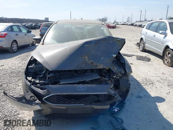 2017 Ford Focus SE с VIN 1FADP3F28HL204391, выставлен на аукционе IAAI как лот 41786975 с пробегом Не указан миль и . История ставок и продаж доступна на DreamBid. Изображение 12.