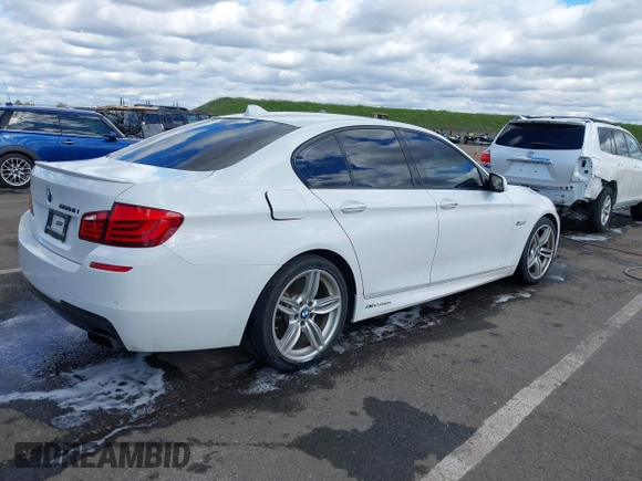 2013 BMW 5 Series 550i with VIN WBAFR9C55DDX79824, listed as a IAAI auction lot 41703036 with 107,166 mi miles and . Bid and sale history available at carsss.com. Image 4.
