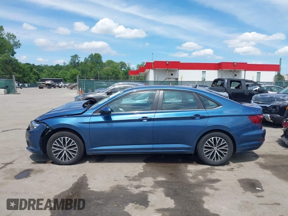 2021 Volkswagen Jetta S z VIN 3VWC57BU6MM046066, wystawiony jako IAAI lot #42199064 z przebiegiem 86 394 mil mil oraz . Historia ofert i sprzedaży dostępna na DreamBid. Obrazek 14.