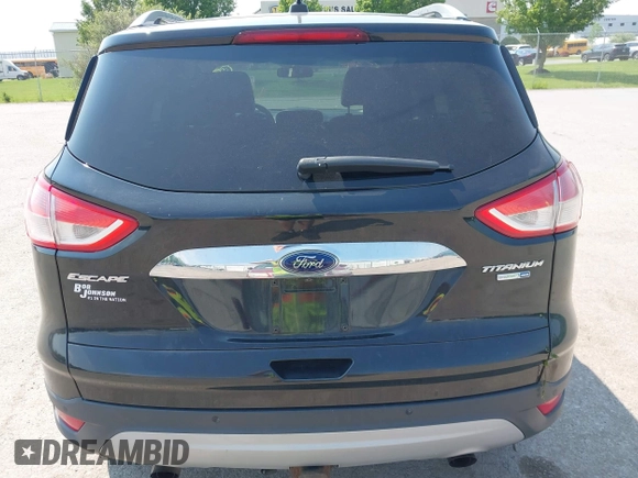 2015 Ford Escape Titanium with VIN 1FMCU9J96FUB58519, listed as a IAAI auction lot 42429369 with 125,541 mi miles and . Bid and sale history available at DreamBid. Image 16.