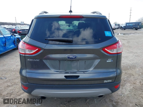 2016 Ford Escape SE z VIN 1FMCU9G92GUC37694, wystawiony jako IAAI lot #41917697 z przebiegiem 78 511 mil mil oraz . Historia ofert i sprzedaży dostępna na DreamBid. Obrazek 16.