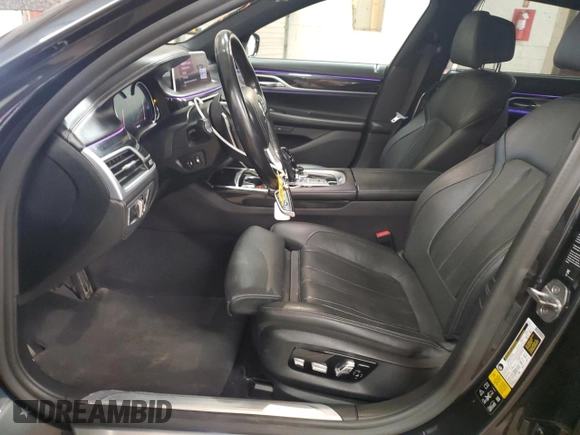 2019 BMW 7 Series 740i xDrive with VIN WBA7E4C51KGV70174, listed as a Copart auction lot 54117075 with 48,743 mi miles and Salvage Title. Bid and sale history available at carsss.com. Image 7.