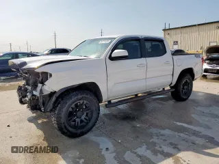 2021 Toyota Tacoma SR z VIN 3TYAX5GNXMT018074, wystawiony jako Copart lot #54731525 z przebiegiem 67 899 mil mil oraz Szkoda całkowita • Salvage title. Historia ofert i sprzedaży dostępna na DreamBid. Obrazek 1.