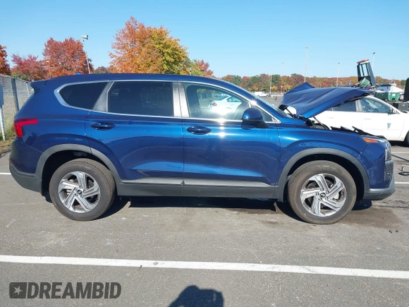 2023 Hyundai Santa Fe SE z VIN 5NMS1DAJ0PH552080, wystawiony jako IAAI lot #40653004 z przebiegiem 5 982 mil mil oraz . Historia ofert i sprzedaży dostępna na DreamBid. Obrazek 13.