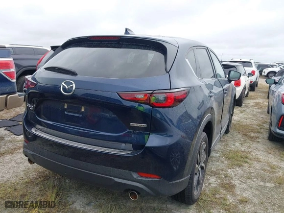 2022 Mazda CX-5 2.5 S Premium Package with VIN JM3KFBDMXN1618807, listed as a IAAI auction lot 40476313 with NaN miles. Bid and sale history available at carsss.com. Image 4.