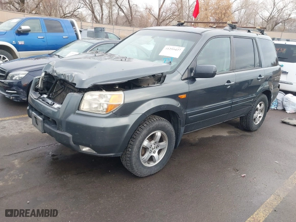 2006 Honda Pilot EX-L with VIN 2HKYF18526H563831, listed as a IAAI auction lot 41255427 with 237,074 mi miles. Bid and sale history available at carsss.com. Image 17.