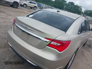 2014 Chrysler 200 Touring with VIN 1C3CCBBBXEN118019, listed as a IAAI auction lot 42154127 with 140,301 mi miles and . Bid and sale history available at carsss.com. Image 4.