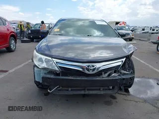 2014 Toyota Camry L with VIN 4T1BF1FK0EU853905, listed as a IAAI auction lot 42217834 with 108,612 mi miles and . Bid and sale history available at DreamBid. Image 6.