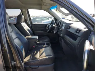 2007 Honda Ridgeline RTL w/Leather with VIN 2HJYK16547H526249, listed as a IAAI auction lot 41769625 with 173,168 mi miles. Bid and sale history available at carsss.com. Image 5.