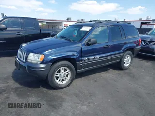 2004 Jeep Grand Cherokee with VIN 1J4GX48J74C283123, listed as a IAAI auction lot 42477393 with 182,491 mi miles and . Bid and sale history available at DreamBid. Image 2.