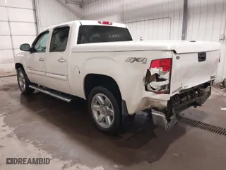 2013 GMC Sierra 1500 SLT with VIN 3GTP2WE76DG197565, listed as a IAAI auction lot 41344388 with 134,972 mi miles. Bid and sale history available at carsss.com. Image 3.