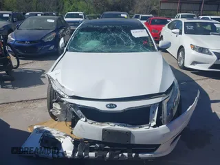2015 Kia Optima SXL Turbo with VIN 5XXGR4A61FG428391, listed as a IAAI auction lot 41869452 with 63,130 mi miles and . Bid and sale history available at DreamBid. Image 6.