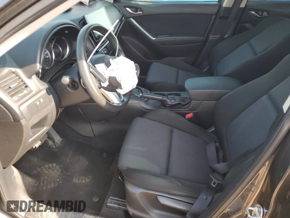 2014 Mazda CX-5 Sport z VIN JM3KE4BE1E0359446, wystawiony jako Copart lot #54562545 z przebiegiem 128 150 mil mil oraz Szkoda całkowita • Salvage title. Historia ofert i sprzedaży dostępna na DreamBid. Obrazek 7.