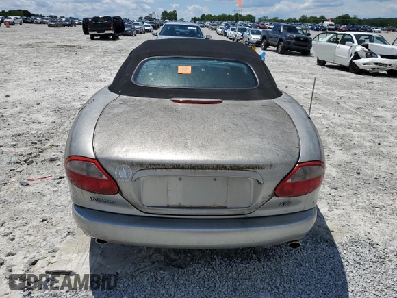 1999 Jaguar XK z VIN SAJGX2049XC034022, wystawiony jako Copart lot #55690025 z przebiegiem Nie podano mil oraz Tytuł czysty. Historia ofert i sprzedaży dostępna na DreamBid. Obrazek 6.