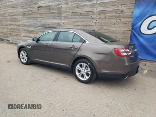 2016 Ford Taurus SEL with VIN 1FAHP2H86GG132160, listed as a Copart auction lot 61489735 with 135,437 mi miles and Clean title. Bid and sale history available at DreamBid. Image 2.
