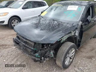 2018 Volkswagen Tiguan S with VIN 3VV1B7AX1JM076071, listed as a IAAI auction lot 42043311 with 107,883 mi miles and . Bid and sale history available at DreamBid. Image 6.