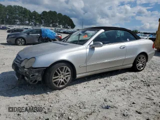 2009 Mercedes-Benz CLK 350 with VIN WDBTK56F39T107084, listed as a Copart auction lot 64449415 with 144,485 mi miles and Salvage title. Bid and sale history available at DreamBid. Image 1.