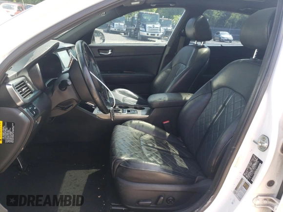 2016 Kia Optima SXL Turbo z VIN 5XXGV4L20GG121446, wystawiony jako Copart lot #57895125 z przebiegiem 131 889 mil mil oraz Czysty tytuł • Clean title. Historia ofert i sprzedaży dostępna na DreamBid. Obrazek 7.