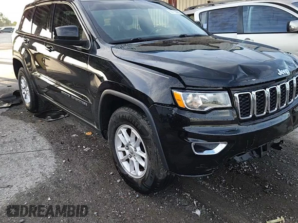 2020 Jeep Grand Cherokee Laredo E with VIN 1C4RJEAG7LC113542, listed as a Copart auction lot 62715585 with 64,124 mi miles and Salvage title. Bid and sale history available at DreamBid. Image 14.