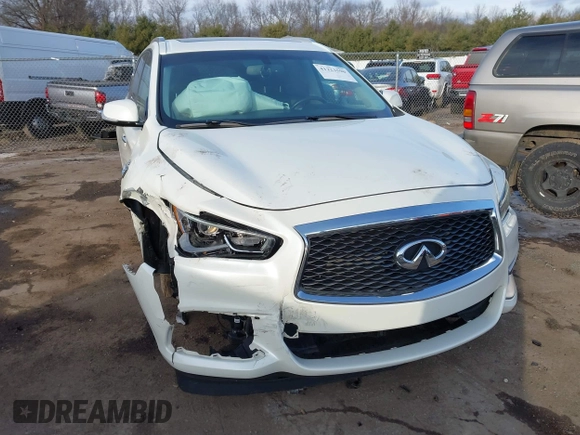 2016 Infiniti QX60 with VIN 5N1AL0MM8GC515986, listed as a IAAI auction lot 41223590 with 99,789 mi miles and . Bid and sale history available at DreamBid. Image 1.