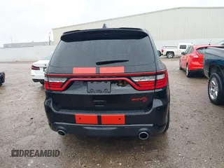 2023 Dodge Durango SRT Hellcat Premium with VIN 1C4SDJH99PC584770, listed as a IAAI auction lot 41562157 with 14,598 mi miles and . Bid and sale history available at DreamBid. Image 16.