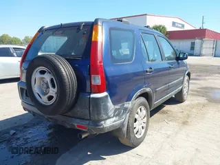 2002 Honda CR-V LX with VIN JHLRD68522C013349, listed as a IAAI auction lot 41794065 with 135,159 mi miles and . Bid and sale history available at DreamBid. Image 4.