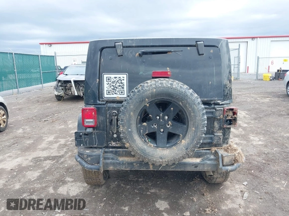 2012 Jeep Wrangler Unlimited Call of Duty MW3 z VIN 1C4BJWFG0CL202238, wystawiony jako IAAI lot #41956648 z przebiegiem 92 572 mil mil oraz . Historia ofert i sprzedaży dostępna na DreamBid. Obrazek 16.