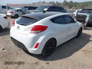 2014 Hyundai Veloster with VIN KMHTC6AD1EU217707, listed as a IAAI auction lot 41718176 with 191,306 mi miles. Bid and sale history available at carsss.com. Image 4.