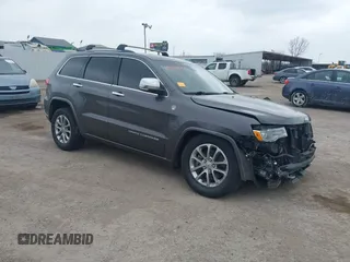 2015 Jeep Grand Cherokee Overland with VIN 1C4RJFCT3FC131122, listed as a IAAI auction lot 41513892 with 125,765 mi miles. Bid and sale history available at carsss.com. Image 1.