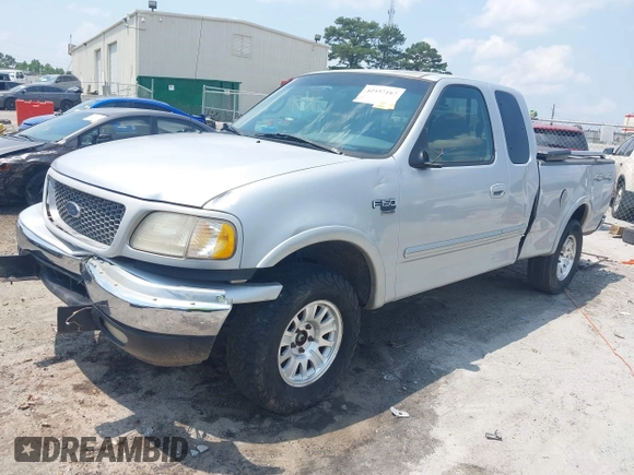 2000 Ford F-150 XL with VIN 1FTRX18L1YNA13975, listed as a IAAI auction lot 42397187 with 235,471 mi miles and . Bid and sale history available at DreamBid. Image 2.