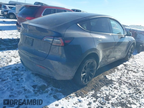 2021 Tesla Model Y Long Range with VIN 5YJYGDEE0MF228744, listed as a IAAI auction lot 41410731 with 32,371 mi miles. Bid and sale history available at carsss.com. Image 4.