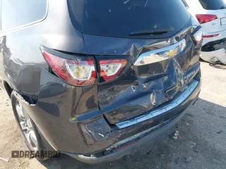 2016 Chevrolet Traverse LTZ z VIN 1GNKRJKD1GJ301277, wystawiony jako IAAI lot #41884629 z przebiegiem 106 338 mil mil oraz . Historia ofert i sprzedaży dostępna na DreamBid. Obrazek 6.