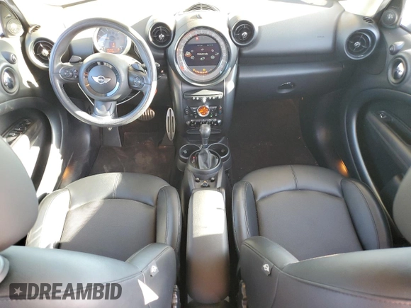 2015 MINI Countryman S with VIN WMWZC5C53FWP44388, listed as a Copart auction lot 54560585 with 67,913 mi miles and Salvage Title. Bid and sale history available at DreamBid. Image 8.