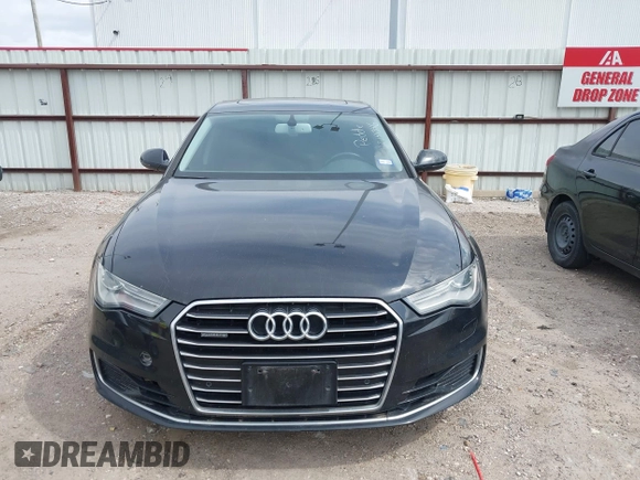 2016 Audi A6 2.0T Premium Plus with VIN WAUGFAFC1GN012799, listed as a IAAI auction lot 42141346 with 101,506 mi miles. Bid and sale history available at carsss.com. Image 12.