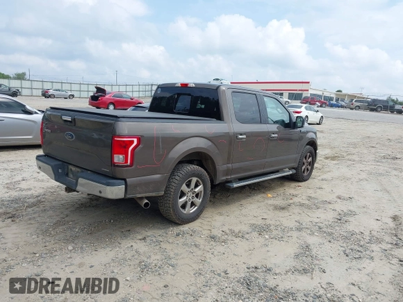 2015 Ford F-150 XL with VIN 1FTEW1CFXFFA01852, listed as a IAAI auction lot 42395926 with 240,514 mi miles and . Bid and sale history available at DreamBid. Image 4.