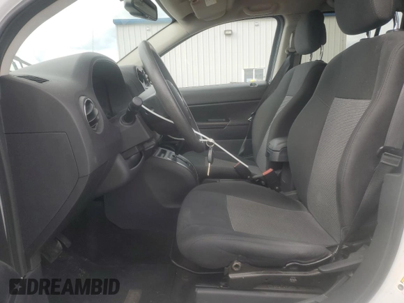 2014 Jeep Compass Sport with VIN 1C4NJDBB7ED503825, listed as a Copart auction lot 49867255 with 116,663 mi miles and Salvage Title. Bid and sale history available at carsss.com. Image 7.